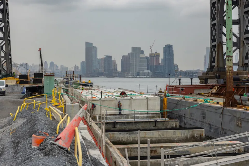 Concrete flood control infrastructure under construction in New York City.